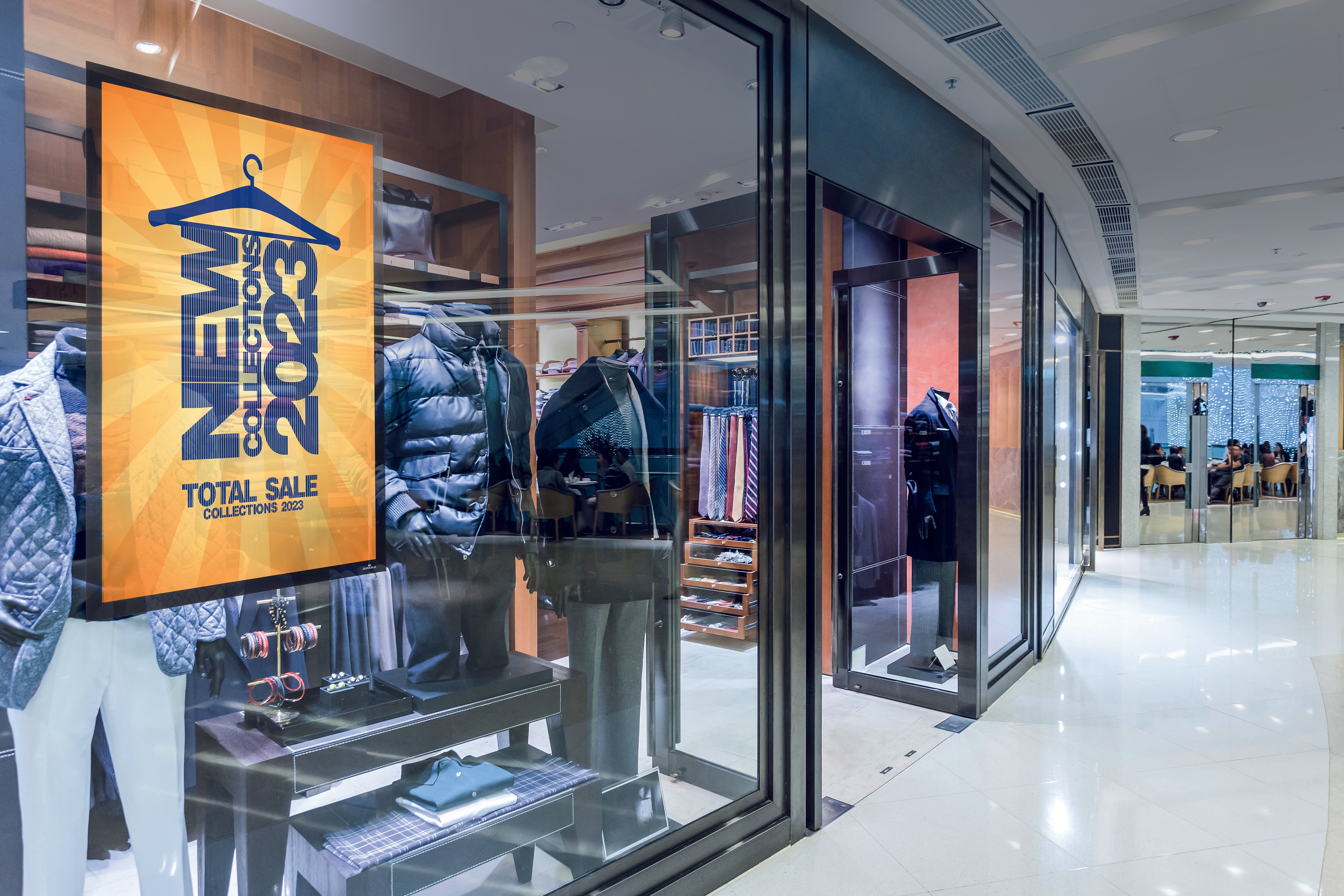 Retail shop with a Duraframe showing a sale sign