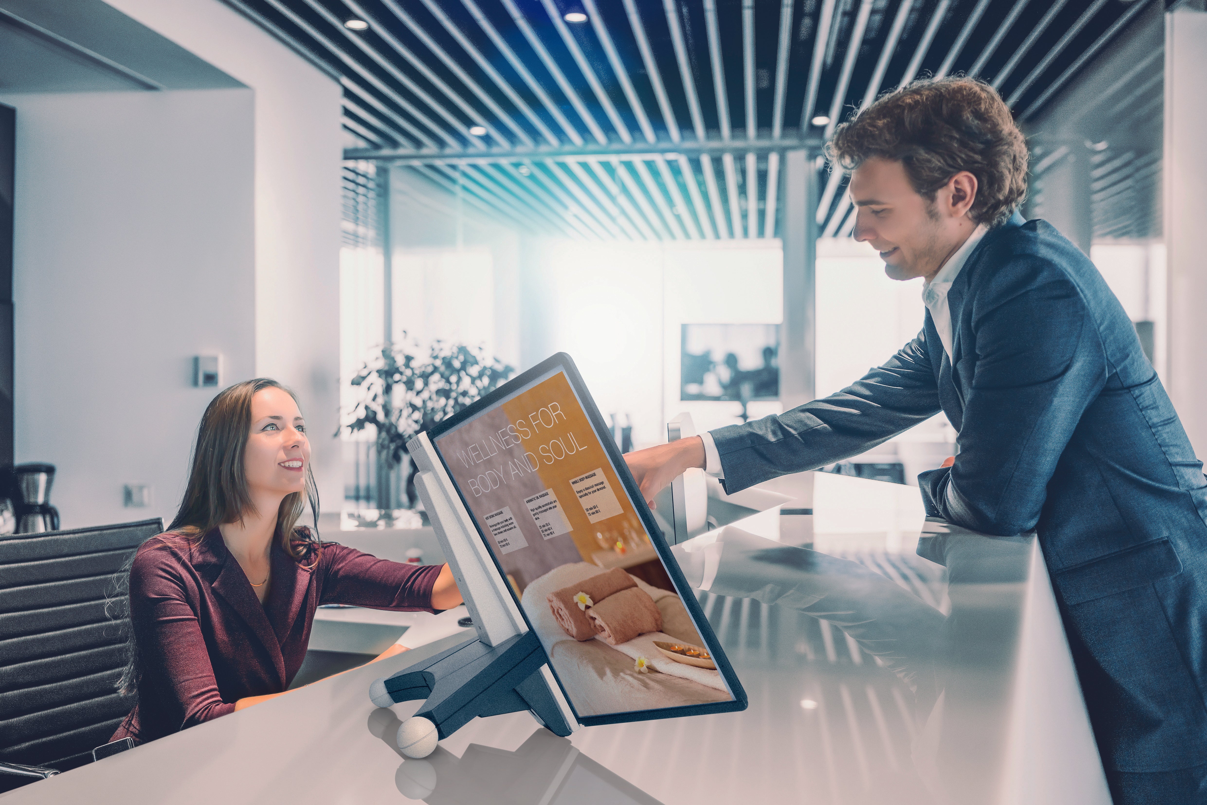 Two people looking at a Durable Reference System on a worktop